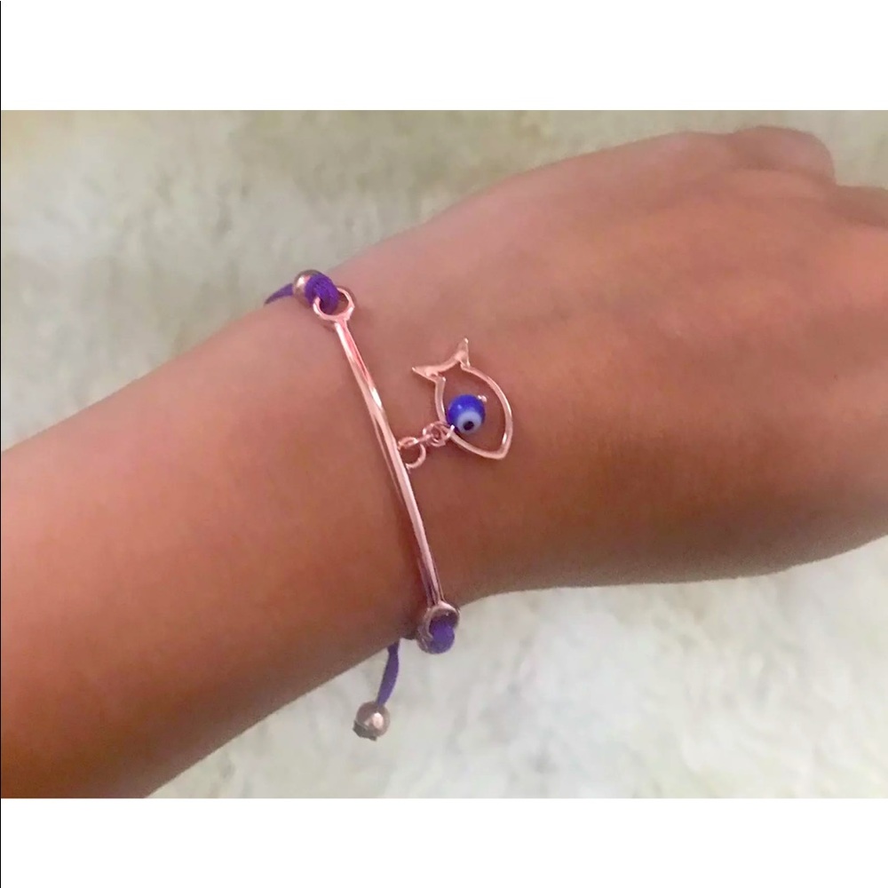 Evil eye bracelet purple adjustable cord w/  Charm